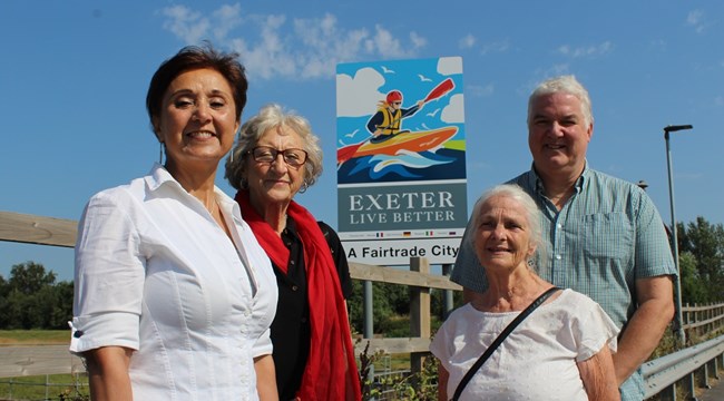 Members of the Steering Group in front of our new city signs